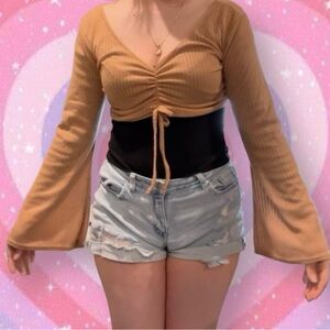 Tan cropped long sleeve shirt